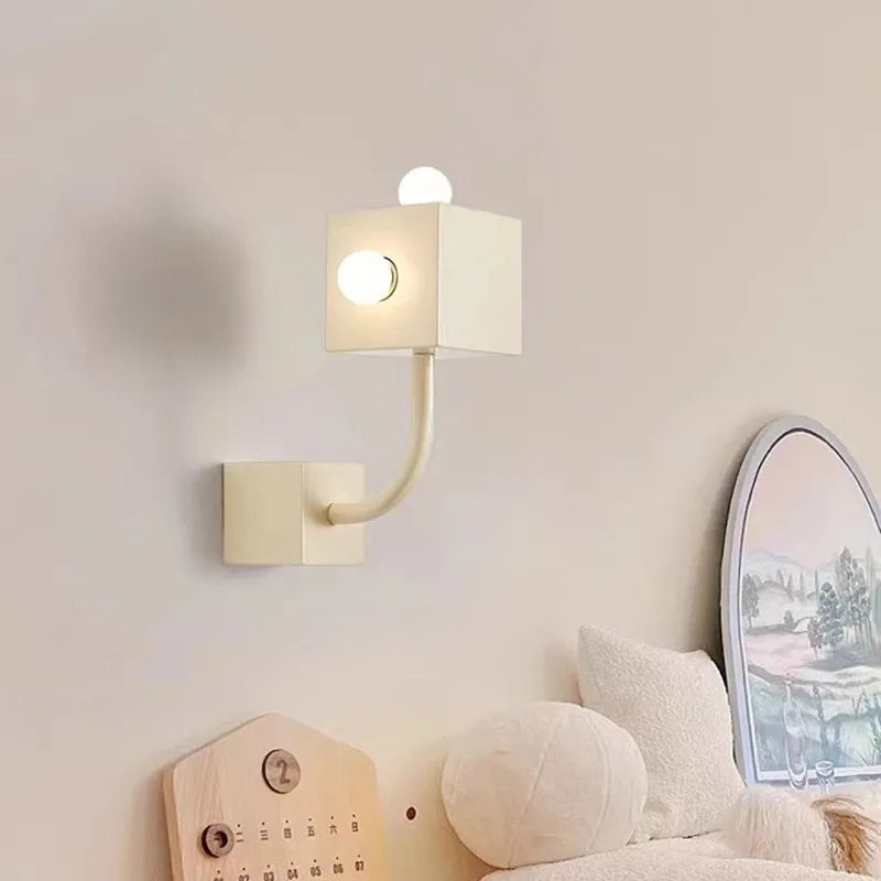 Red Bauhaus wall light in a living room