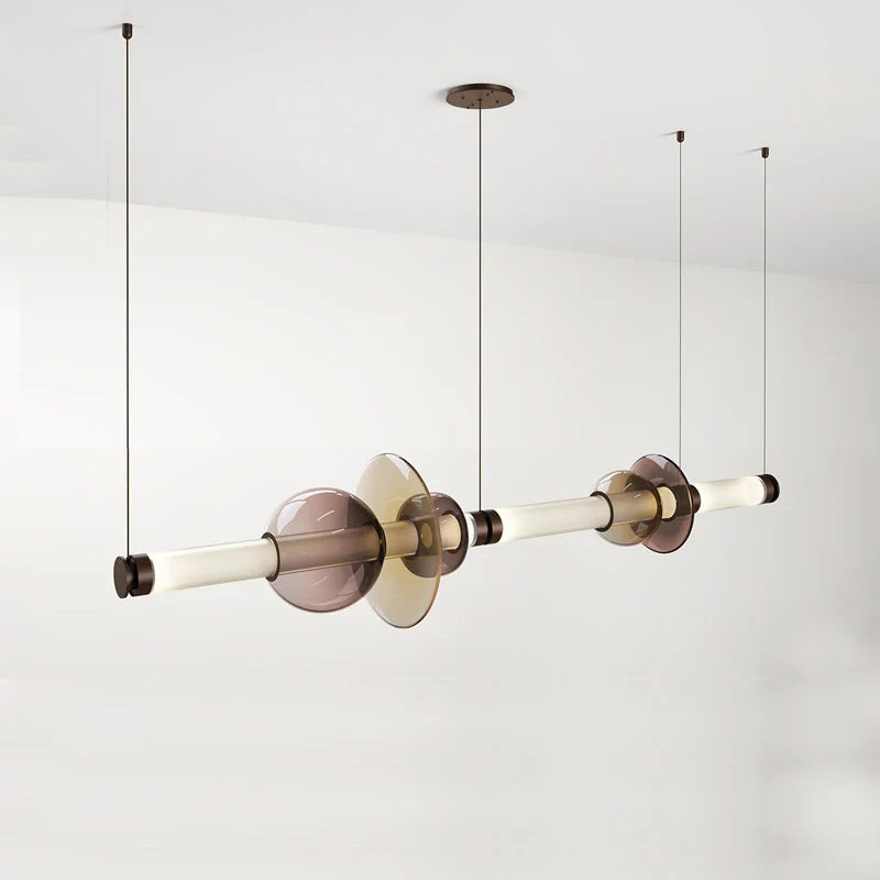 Linear chandelier over a dining table