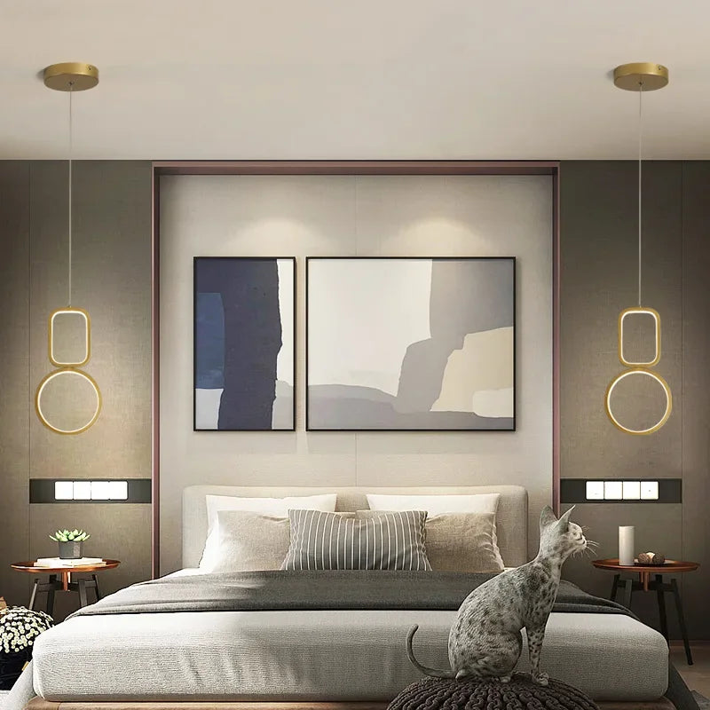 Modern LED pendant in black and gold