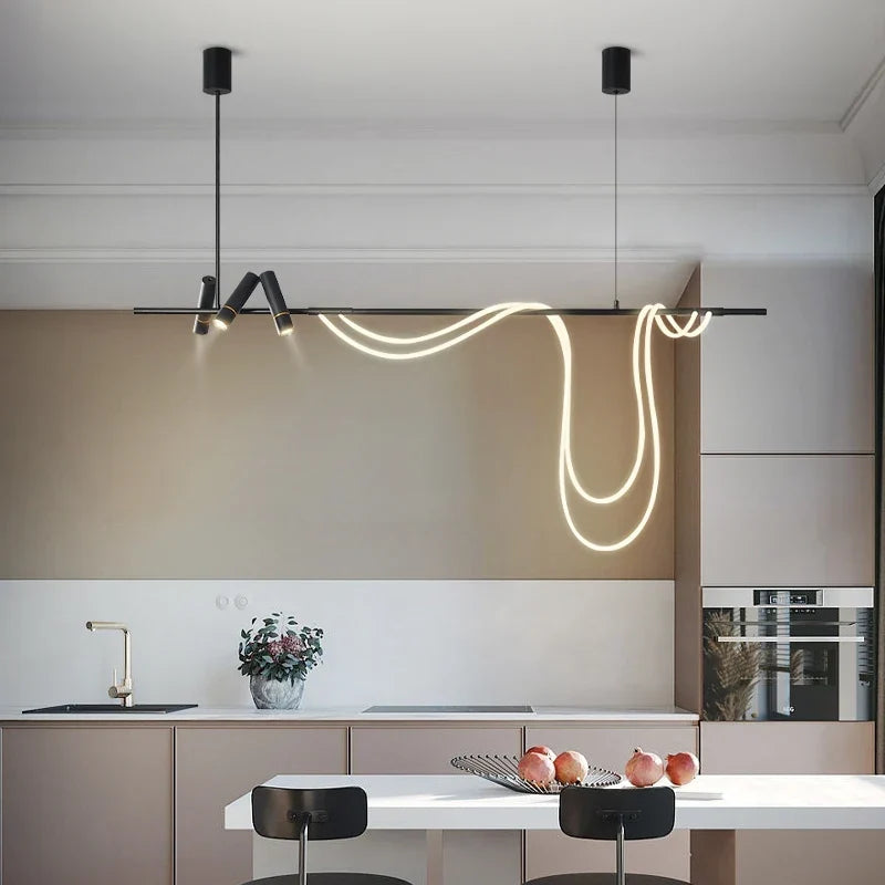 Long LED pendant over a dining table