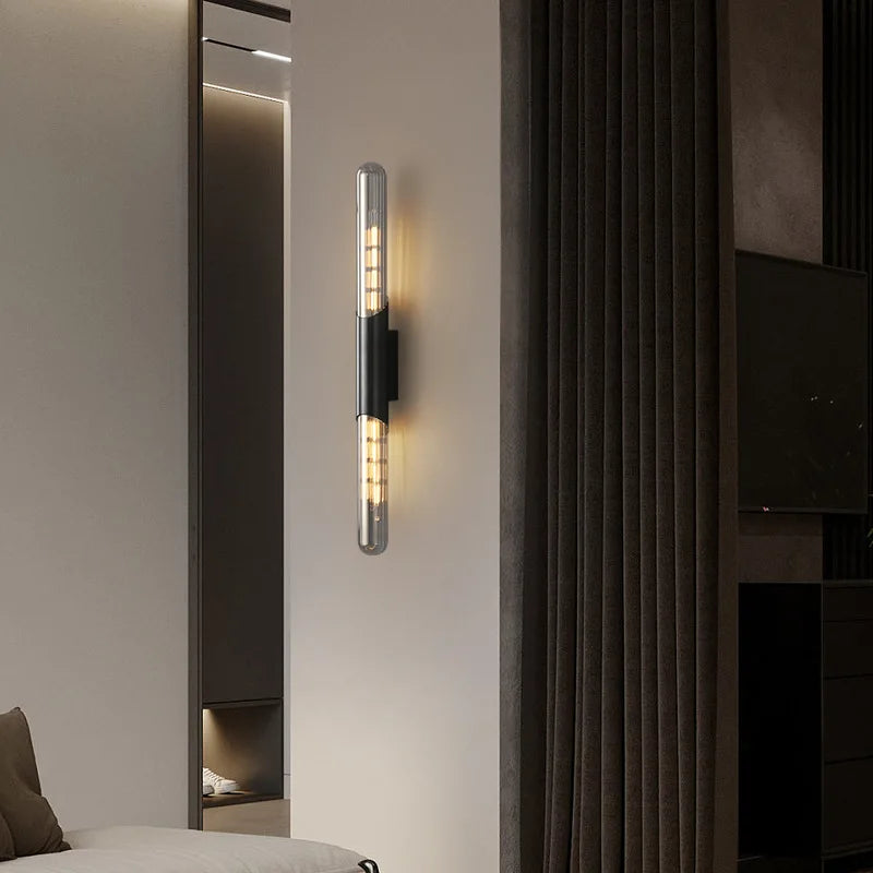 Minimalist brass and clear glass wall light