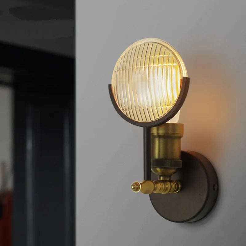 Glass wall light in a hallway