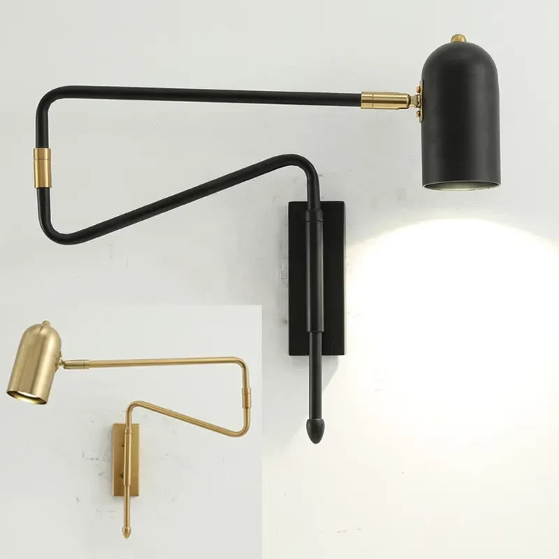 Black arm wall light by a sofa