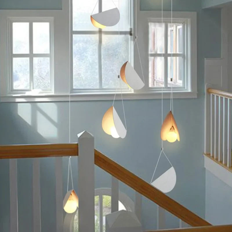 Three-head Nordic pendant over a table