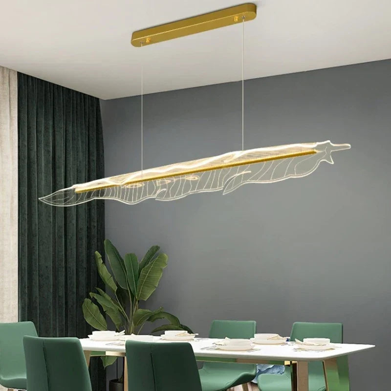 White linear pendant over a dining table