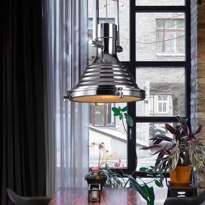 Bronze industrial pendant over a bar