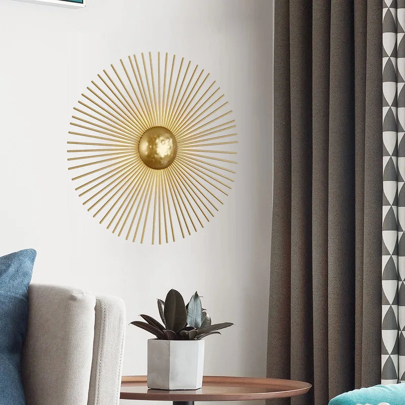 Gold sunburst sconce