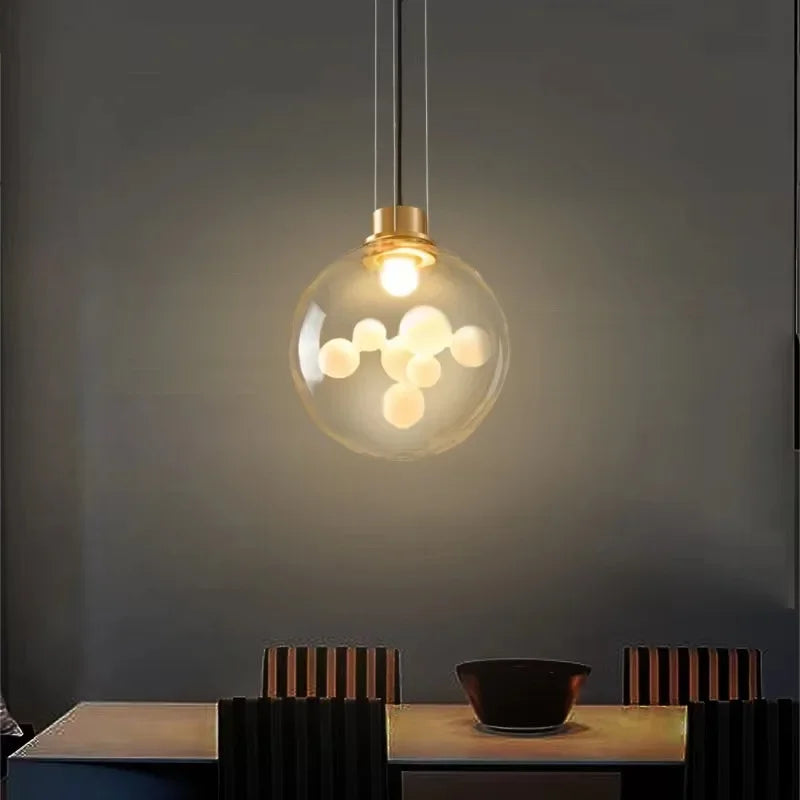 Smoky bubble glass pendant over a table