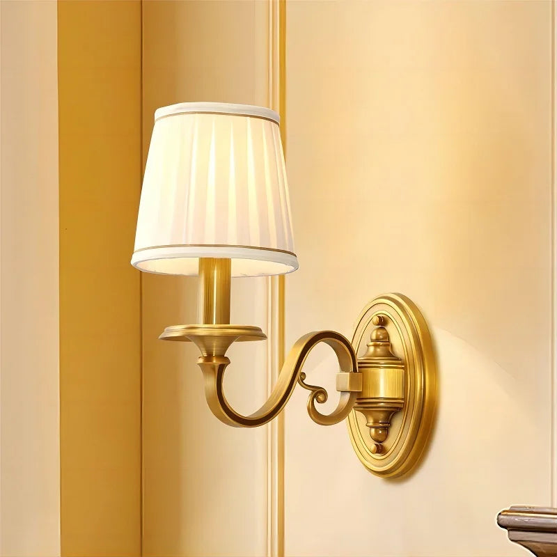Fabric shade wall light in a bedroom