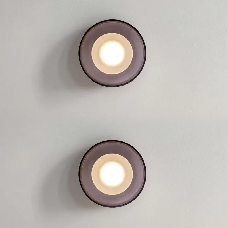 Gray glass bowl sconce in a corridor