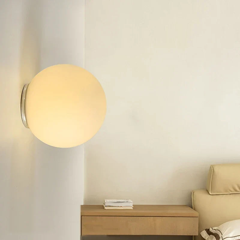 Glass globe wall light