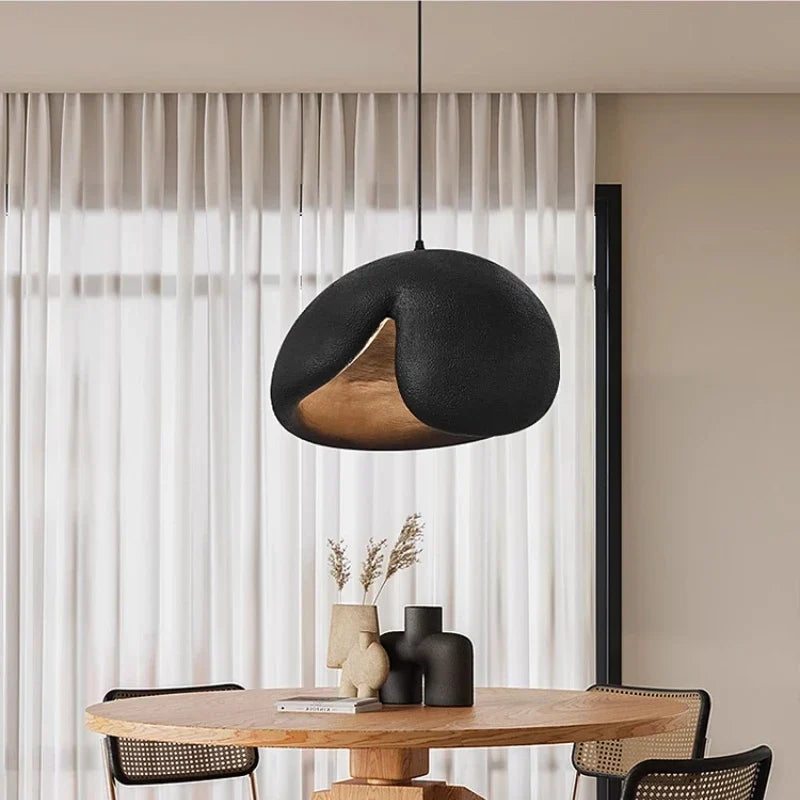 Wabi-sabi pendant over a dining table