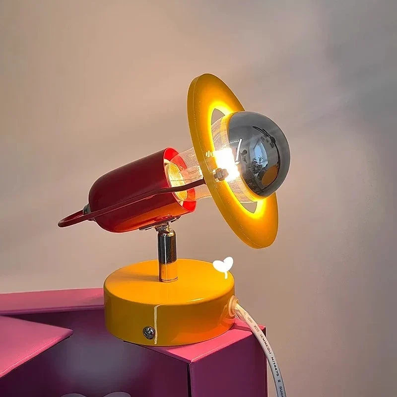 Yellow sconce in a kids room