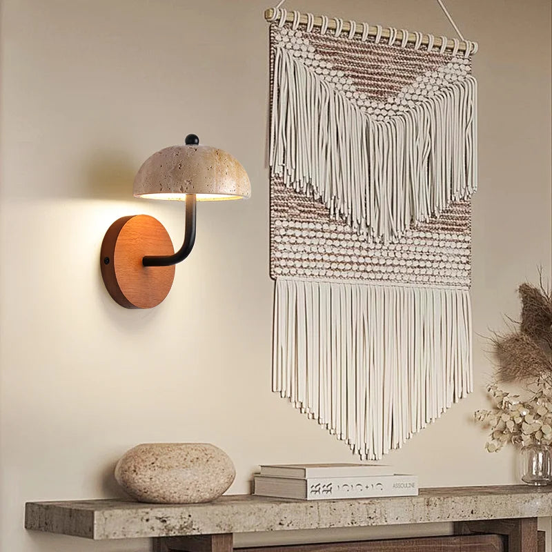 Mushroom stone sconce on a wall