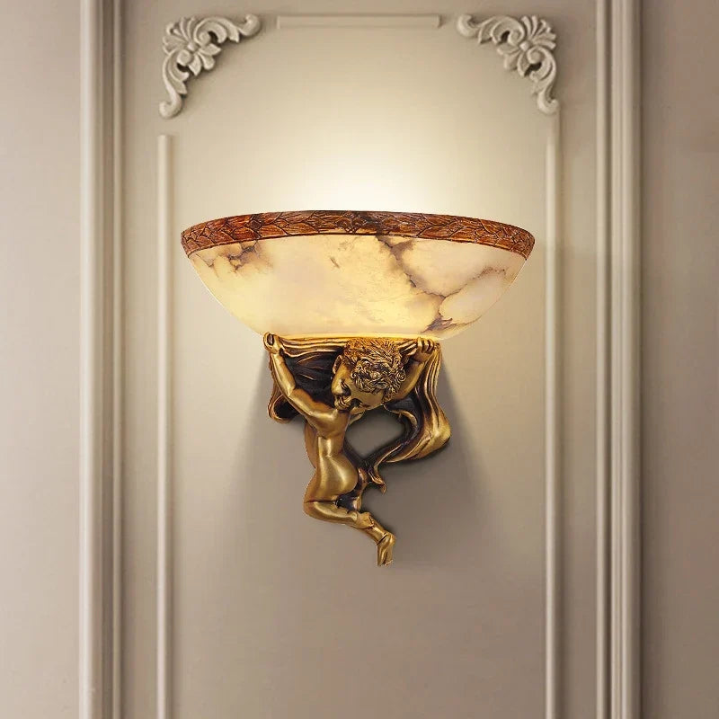 Angel wall light on a staircase