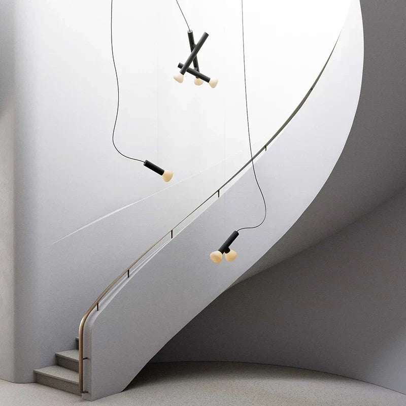 Black glass pendant over a bar