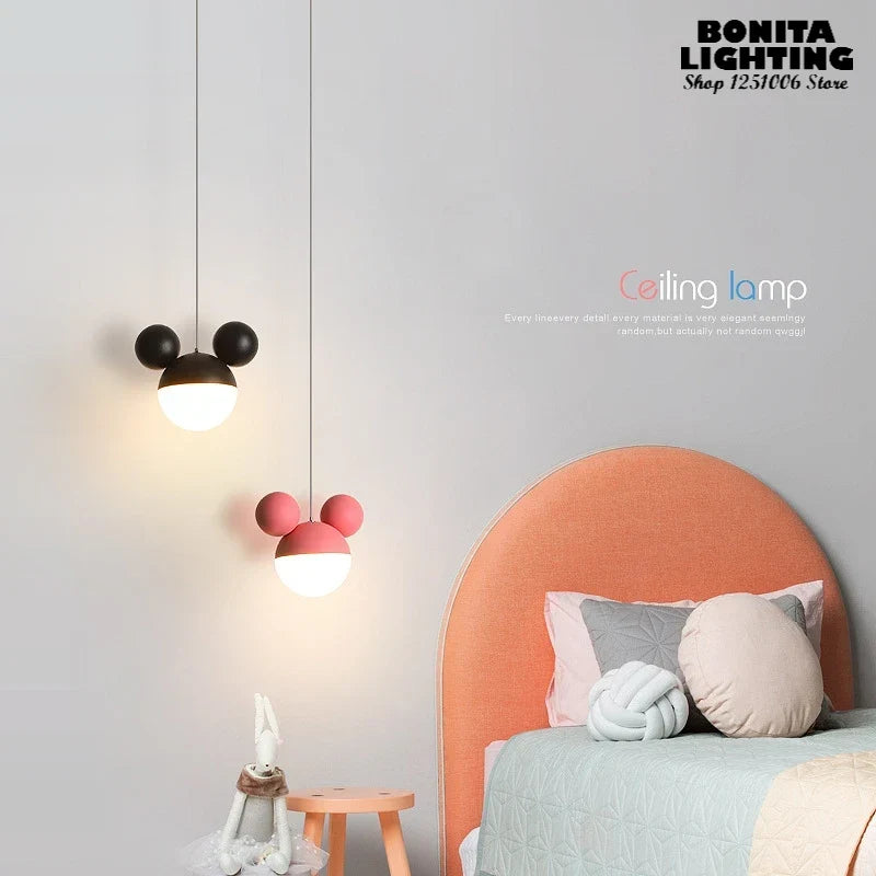 Pink mouse pendant in a kids bedroom