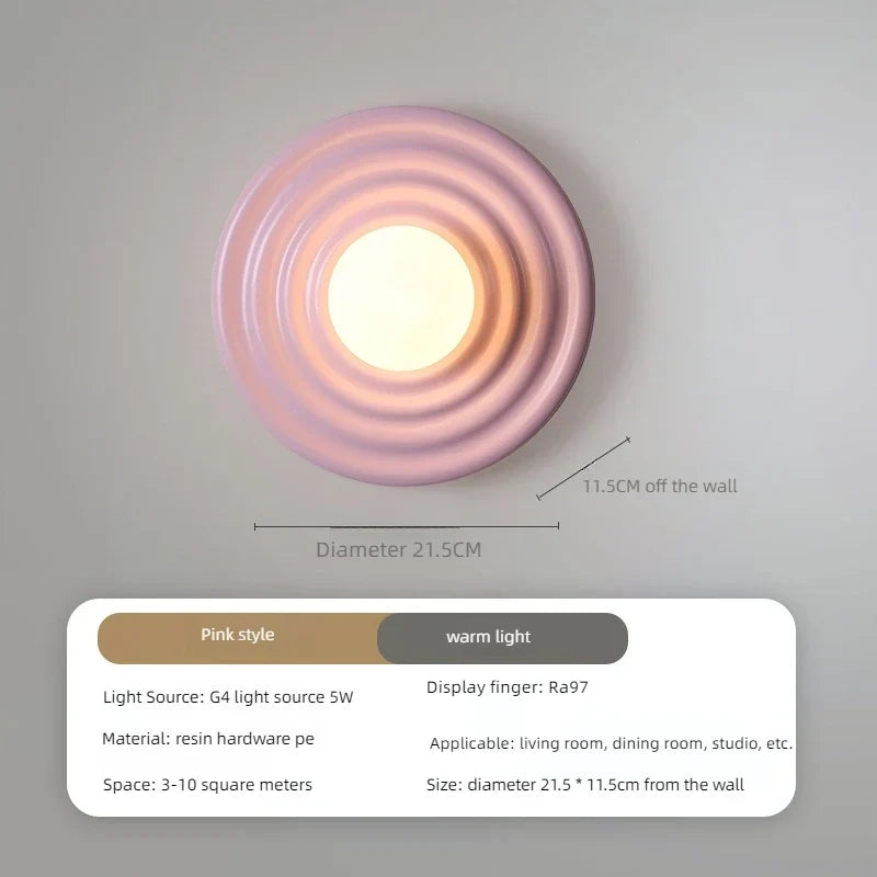 Pink plaster sconce in a bedroom