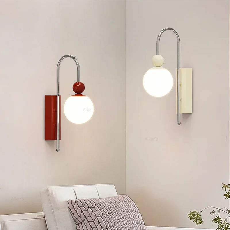 Red metal and glass LED sconce