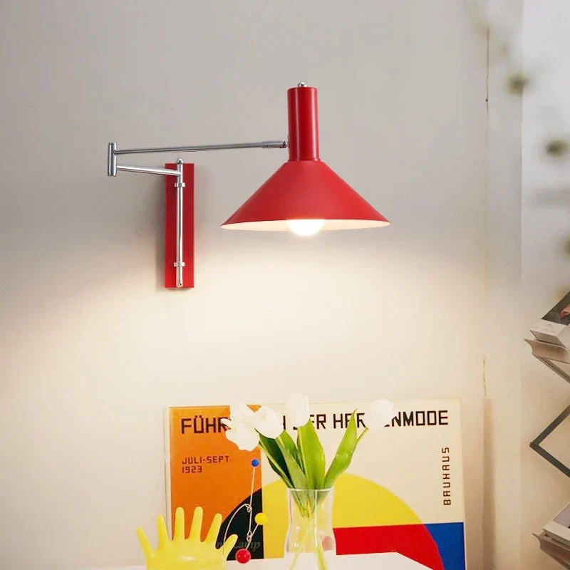 Folding plug in sconce