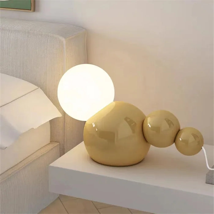 Round glass bedside lamp