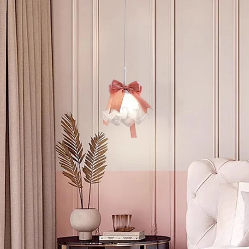 Pink glass pendant in a nursery