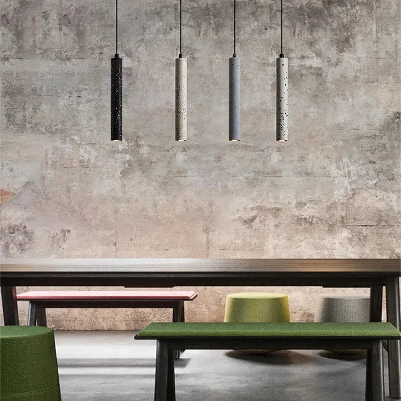 Gray concrete pendant over a counter