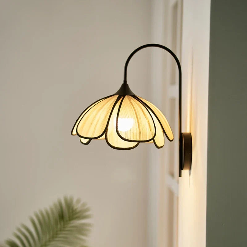 Rattan petal wall light in a tea room