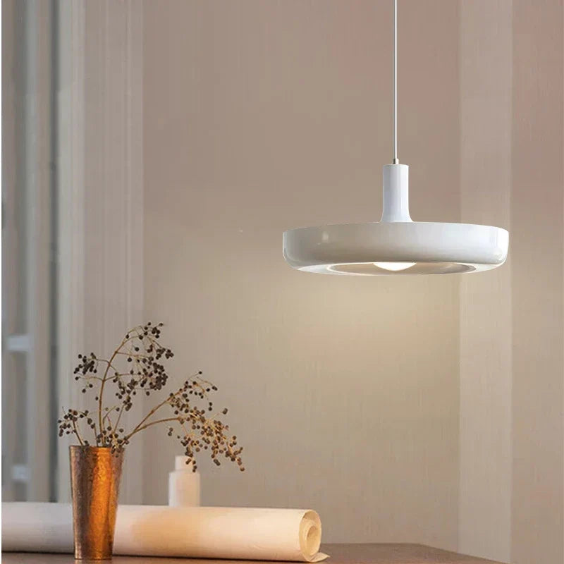 Red pendant over a kitchen table