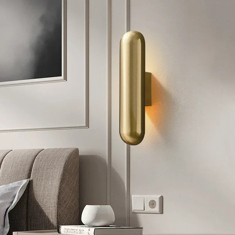 Vintage gold wall light in a hallway