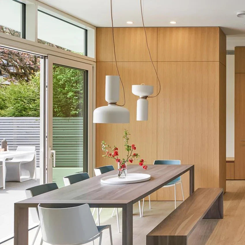 Gray LED pendant over a table