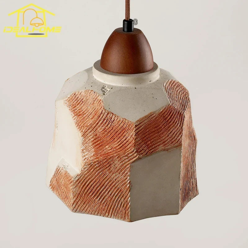 Cement pendant over a kitchen island