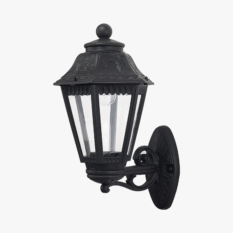 Black outdoor wall light in a villa garden