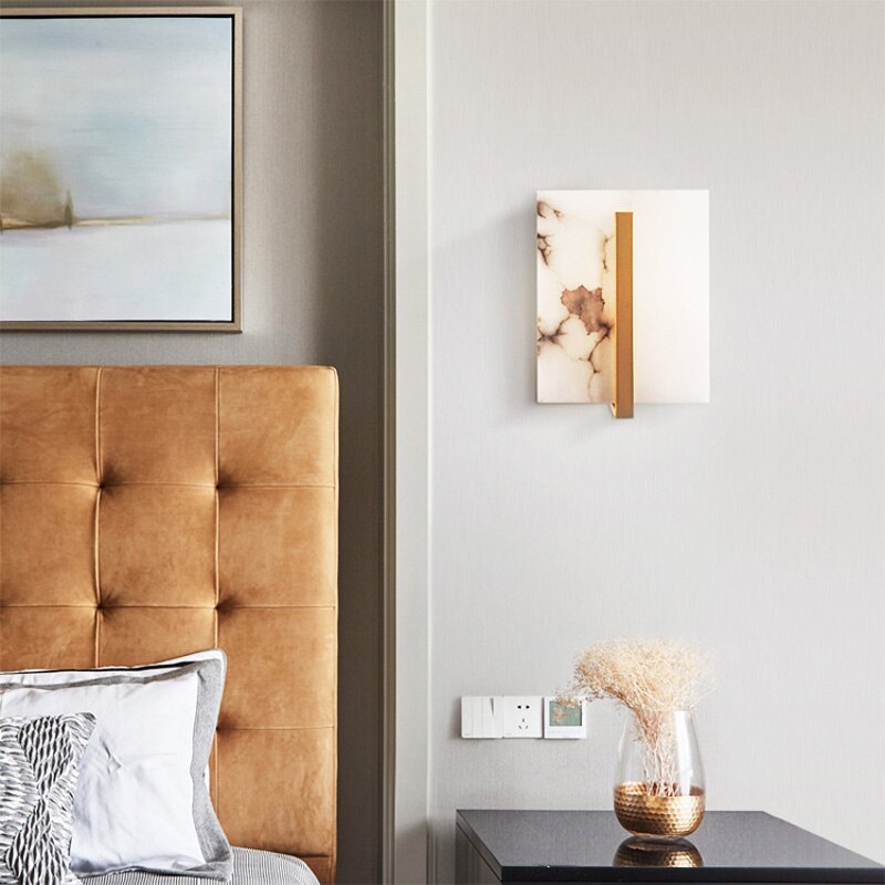 Marble gold wall light in a living room