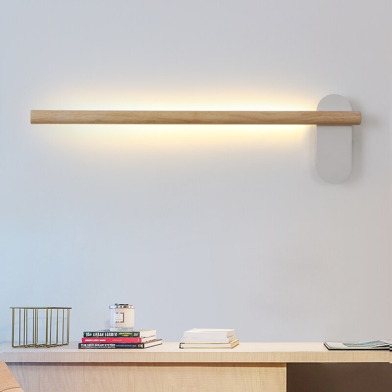 Wood rectangle wall light above a bed